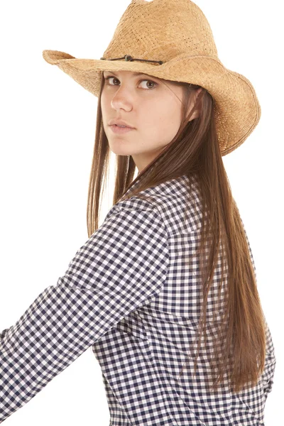 Allvarliga sit sidled cowgirl — Stockfoto