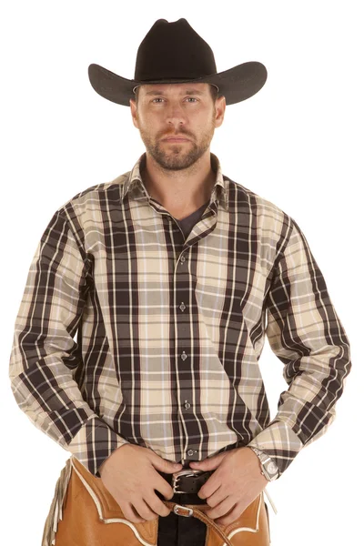 Cowboy hold belt black hat Stock Photo