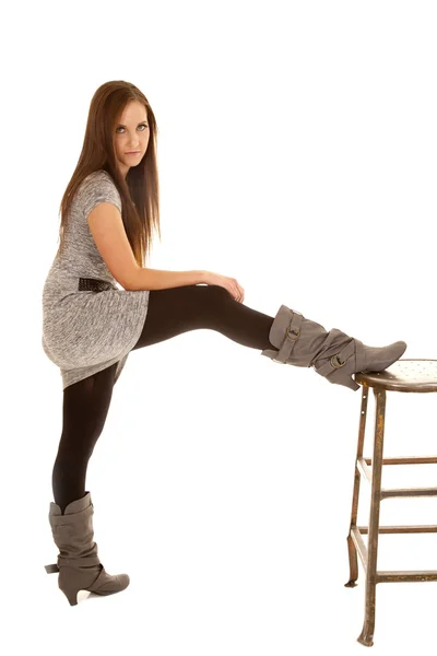 Put leg up on stool — Stock Photo, Image