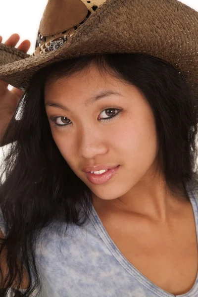 Asian woman blue top hat serious — Stock Photo, Image