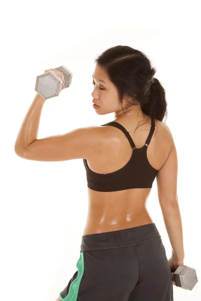 Asiatisk kvinna sida svart topp vikter — Stockfoto