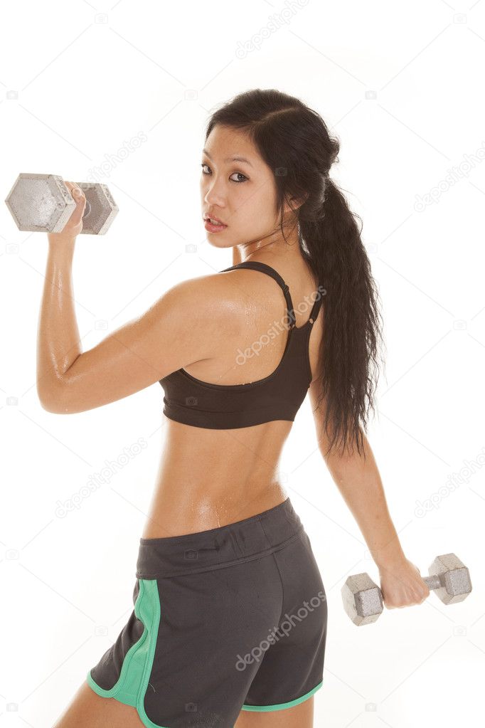 asian woman fitness side weights