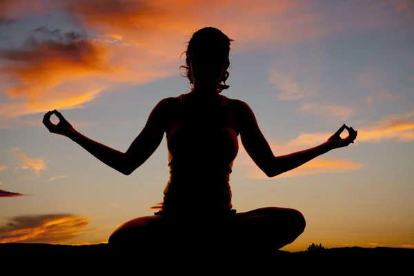 Silhouette woman yoga front sit Stock Image