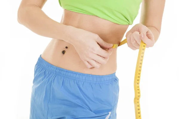 Fitness green top measure waist — Stock Photo, Image