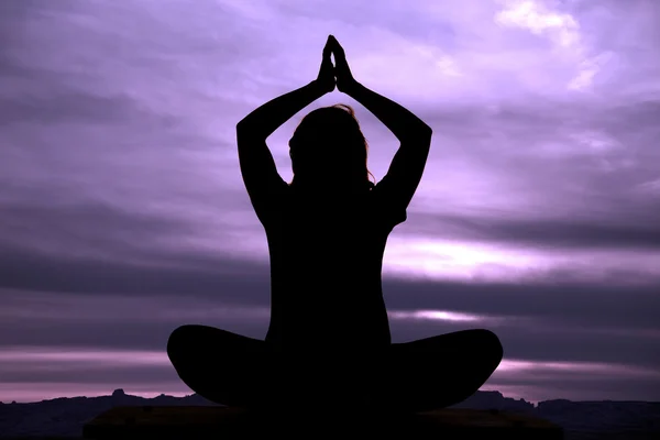 Over head sit silhouette — Stock Photo, Image