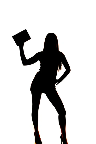 Silhouette woman hold up one book — Stock Photo, Image