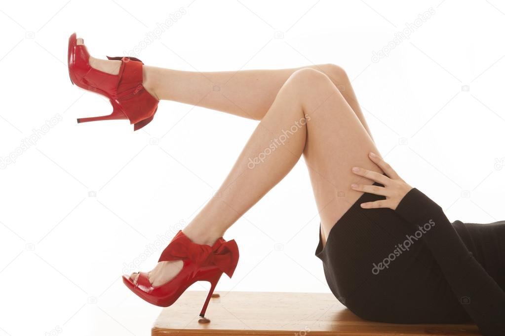 red shoes black dress legs lay