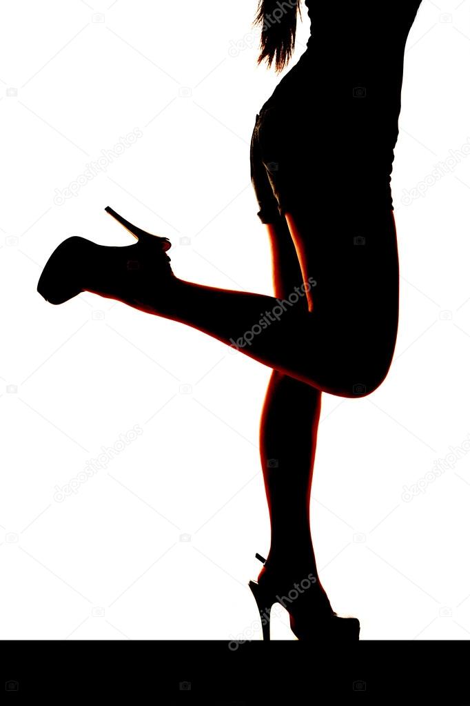silhouette woman legs kicked back