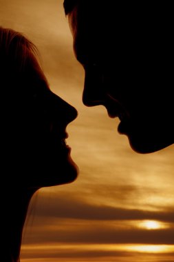 siluet çift kafa yakın günbatımı vurdu