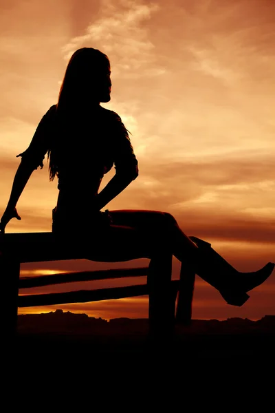 Silhouette sunset woman sitting — Stock Photo, Image