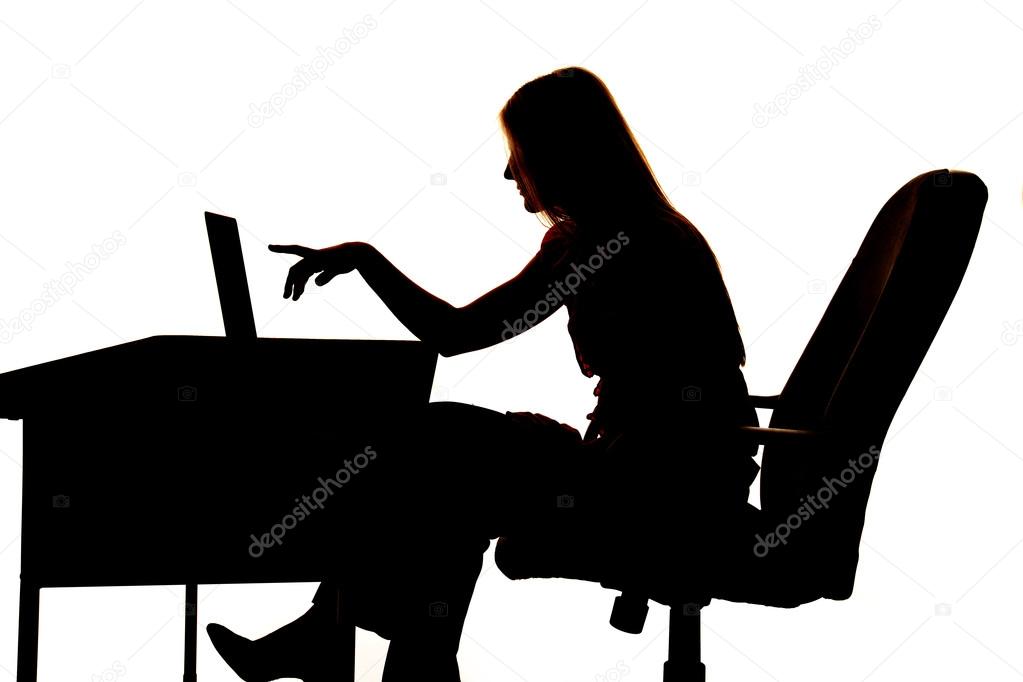 Silhouette woman pointing computer