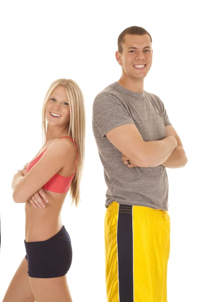 Couple fitness stand back to back — Stock Photo, Image