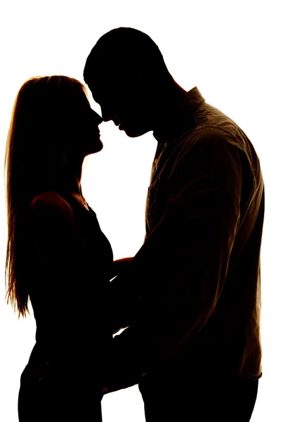 Silhouette couple noses touching — Stock Photo, Image