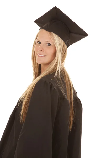 Mujer graduada mira atrás sonrisa —  Fotos de Stock