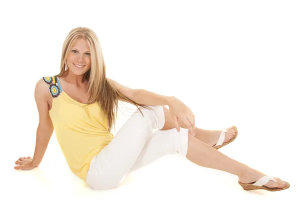 Woman yellow and white sitting smile — Stock Photo, Image