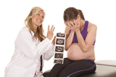 doctor pregnant woman ultrasound triplets shocked clipart