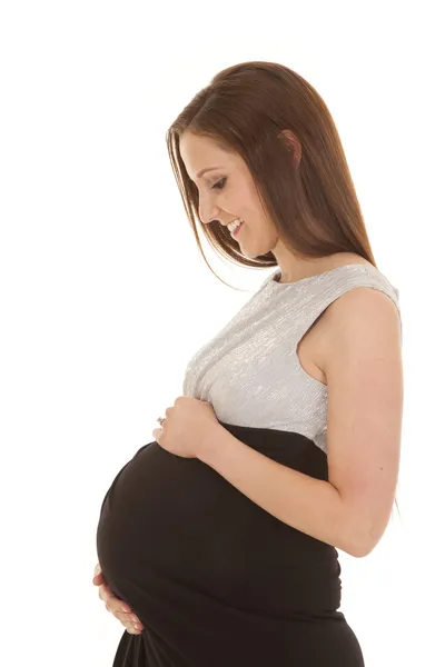 Siyah ve gri hamile karnına tut — Stok fotoğraf