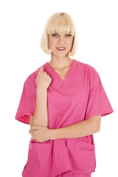 Mujer enfermera traje sonrisa mano en el codo — Foto de Stock