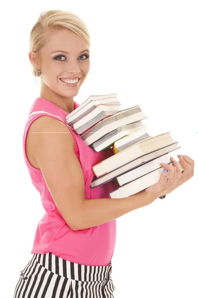 Mujer en rosa y negro rayas libros lado sonrisa — Foto de Stock