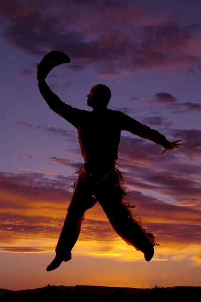 Cowboy jump in sunset — Stock Photo, Image