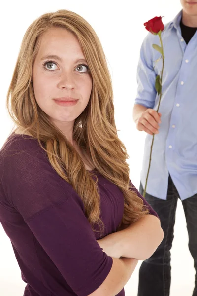 Girl look up boy behind with rose — Stock Photo, Image