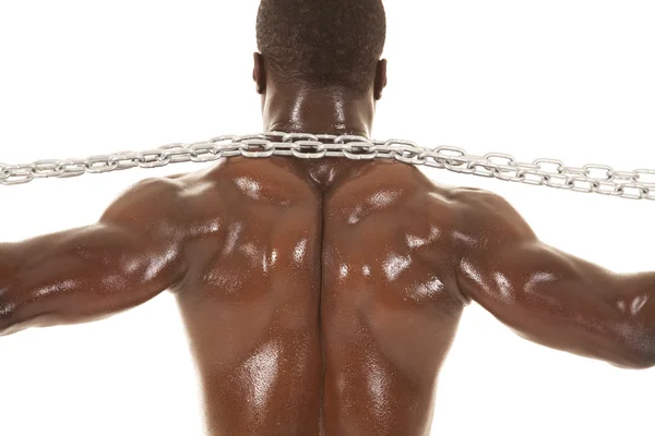 Hombre fuerte con cadena en el cuello trasero —  Fotos de Stock