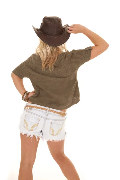 Mujer suéter occidental sombrero espalda mano cadera —  Fotos de Stock