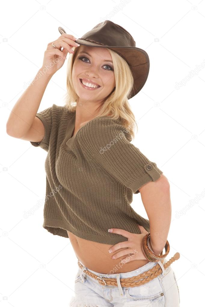 woman sweater western hat touch smile