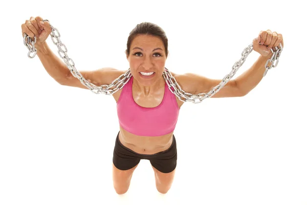 Woman pink sports bra chain kneel — Stock Photo, Image