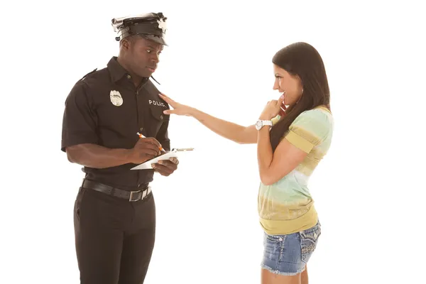 Policeman writing ticket woman flirting — Stock Photo, Image