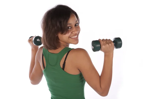 Woman using weights — Stock Photo, Image