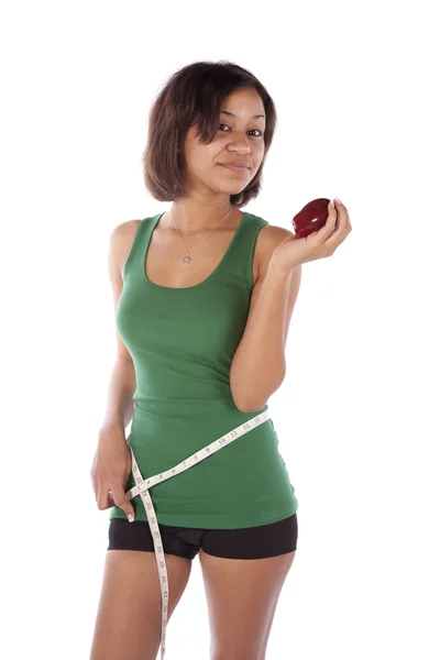 Kobieta mierzy talię. — Zdjęcie stockowe