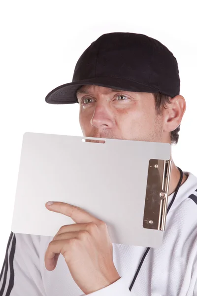 Coach behind clipboard — Stock Photo, Image