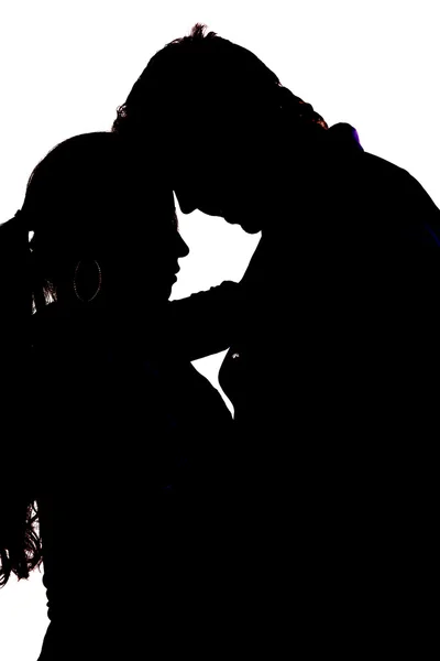 Silhouette couple debout têtes ensemble — Photo