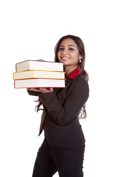 Женщина держит стопку книг — стоковое фото