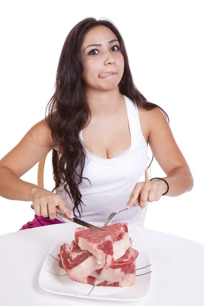 Mujer con plato de filetes lamiendo . — Foto de Stock