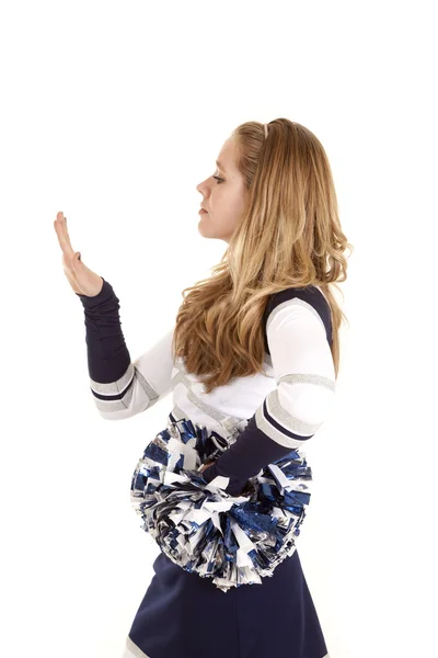 Cheerleader op zoek op nagels — Stockfoto
