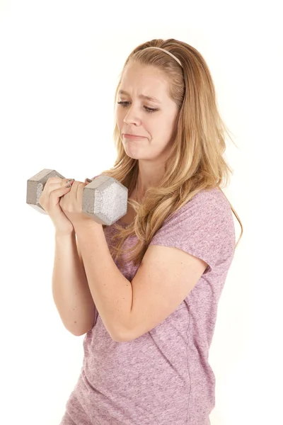 Girl weights look at — Stock Photo, Image