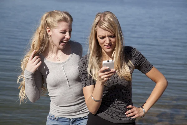 Woman lake phone laugh — Stock Photo, Image