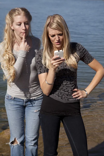 Woman lake phone thinking — Stock Photo, Image
