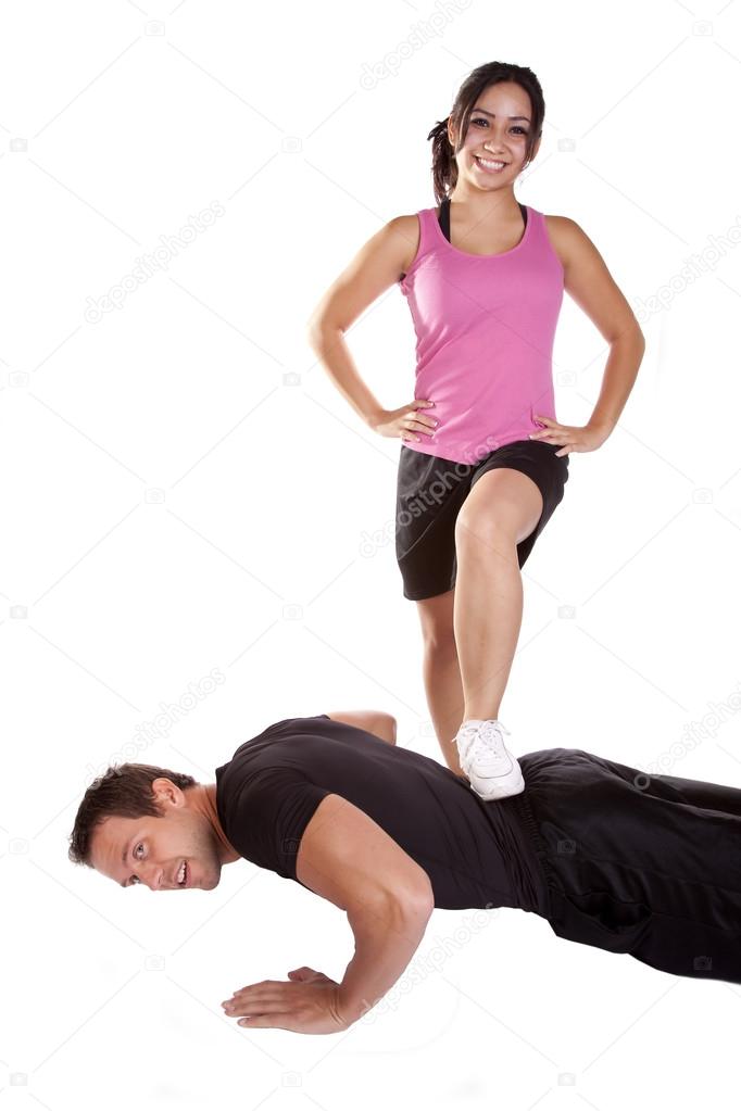 depositphotos_29578425-stock-photo-woman-stepping-on-man-pushups.jpg