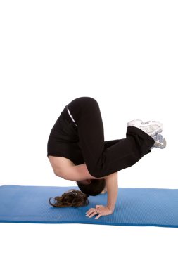 Vinç bir yoga hareket yapıyor kadın
