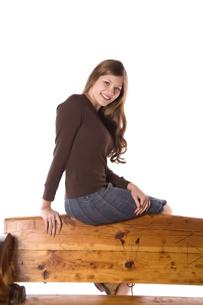 Woman on back of bench turned — Stock Photo, Image