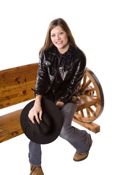 Woman with black jacket on bench — Stock Photo, Image