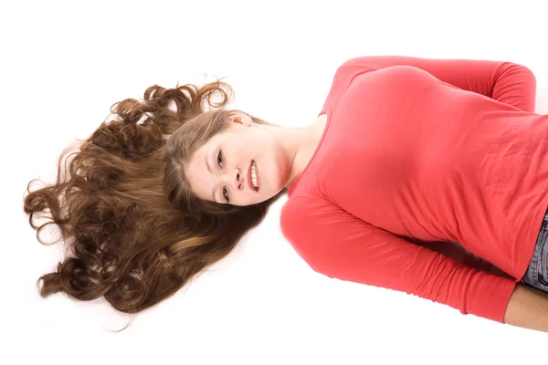 Femme aux cheveux éventés en rouge — Photo