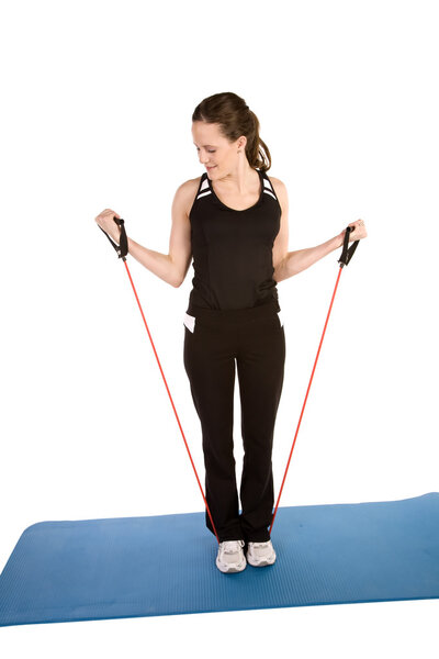 Woman working out with exercise bands