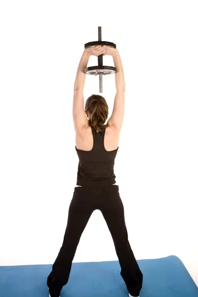 Woman exercising her shoulders and back — Stock Photo, Image