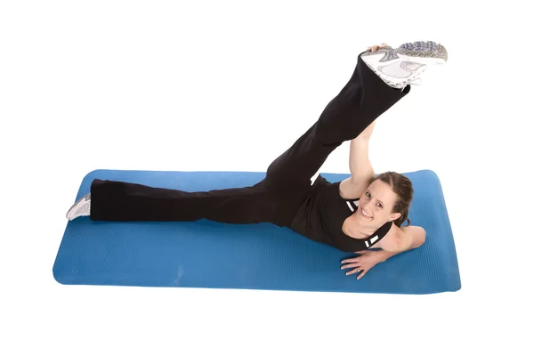 Woman stretching her leg up — Stock Photo, Image