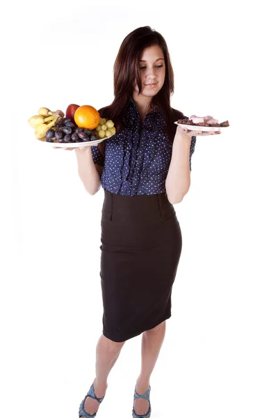 Kvinna frukt desserter slickar läpparna — Stockfoto