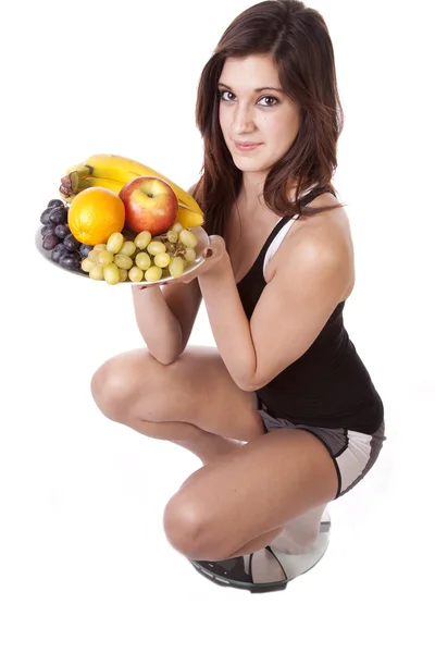 Woman with scales — Stock Photo, Image